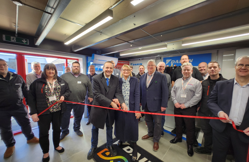 Alberto and Cllr Maggie Wright with owner of Stuart Plumbing and Stuart's team. 