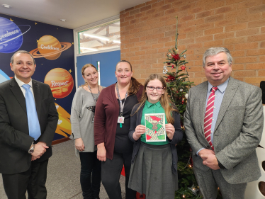 Alberto and Cllr Neil Bannister presenting winners certificate to Isabel, joined by Isabel’s mother and Hallbrook Primary Deputy Head Mrs O’Boyle